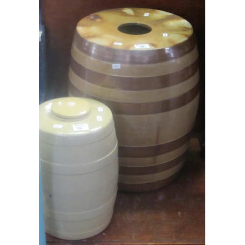 96 - Large earthenware barrel and another ceramic barrel with lid. The largest 47cm high approx. (2)
(B. ... 