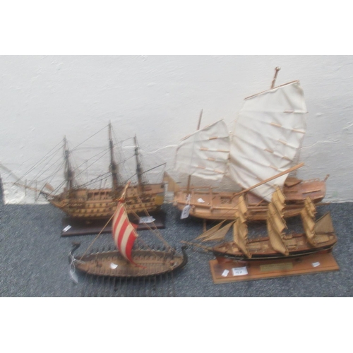 97 - Group of four well detailed ship models to include a Viking long boat, the Cutty Sark, and HMS Victo... 