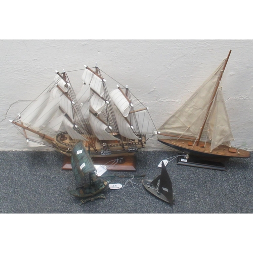 98 - Four ship models to include a wooden model of The Endeavour, a brass sailing dinghy, a brass Middle ... 