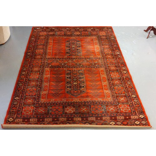 530 - Large middle eastern design red ground carpet having geometric floral and foliate designs 292x200cm ... 