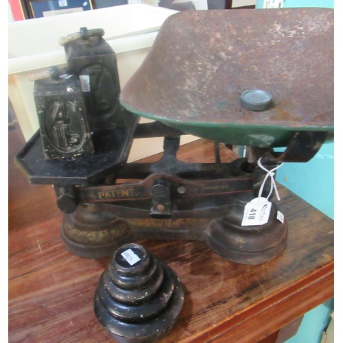 418 - Vintage cast iron patent scales with pan and weights ranging down from 7 pounds.
(B.P. 21% + VAT)