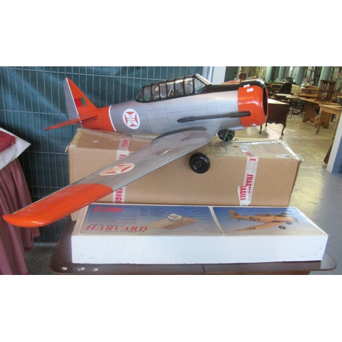 506 - Flying model of a North American Harvard Trailer Aircraft, together with a kit form 1:5 scale AH Des... 