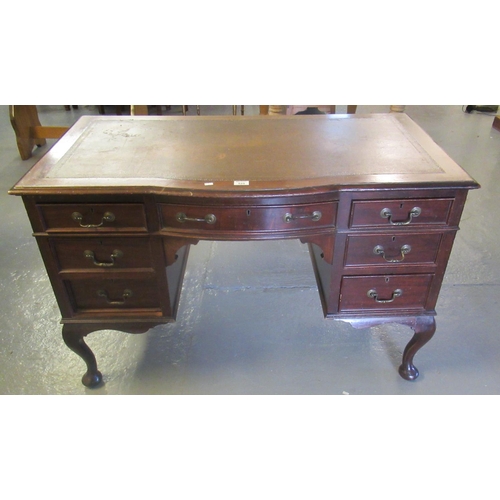 525 - Mid 20th century Waring & Gillow mahogany knee hole writing desk with inset leather top and a bow fr... 