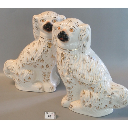 66 - Pair of early 20th Century large Staffordshire Pottery Fireside Seated Spaniels with painted feature... 