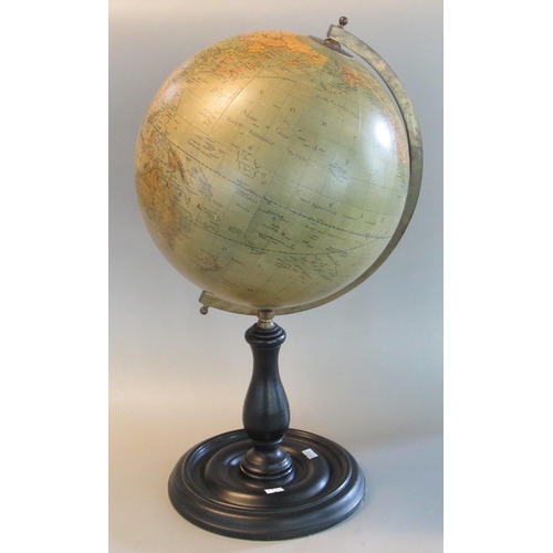 67 - Modern terrestrial globe on moulded wooden stand. Overall 58cm high approx.
(B.P. 21% + VAT)