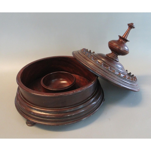 72 - 19th century treen moulded mahogany circular bowl and cover with baluster finial, removable to revea... 