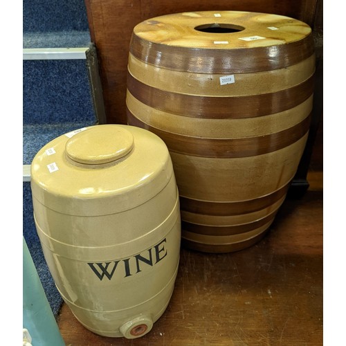 80 - Large earthenware barrel and another ceramic barrel with lid labelled 'WINE'. The largest 47cm high ... 