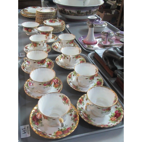 379 - Three trays of Royal Albert 'Old Country Roses', to include: 9 cups and saucers, 7 saucers, 17 tea p... 