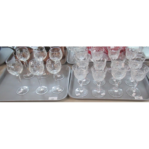 395 - Six trays of assorted drinking glasses to include: 6 cut glass hock glasses, large selection of sher... 