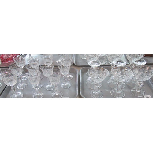 395 - Six trays of assorted drinking glasses to include: 6 cut glass hock glasses, large selection of sher... 