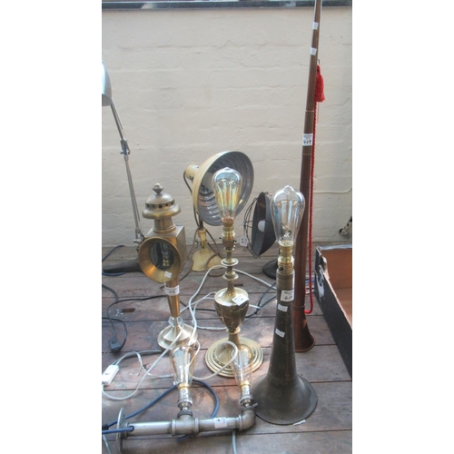 419 - Group of assorted novelty table lamps to include two hunting horn lamps, double plumbing pipe lamp, ... 