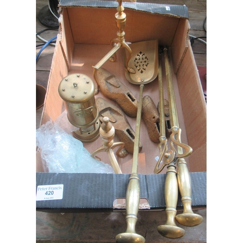 420 - Set of three brass fire irons, a pair of andirons, a brass miner's safety lamp and three cast iron s... 