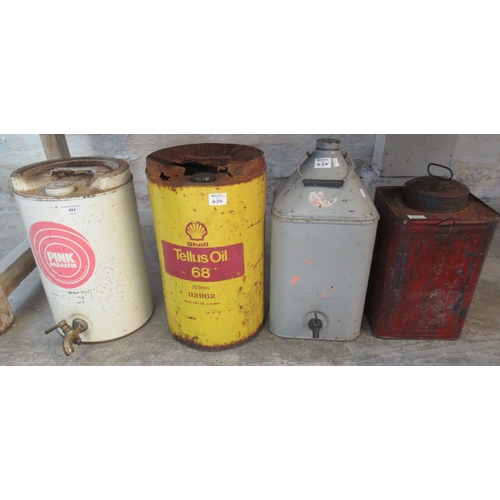 424 - Collection of vintage cans to include pink paraffin with brass tap, Shell Tellus Oil 68, and two squ... 