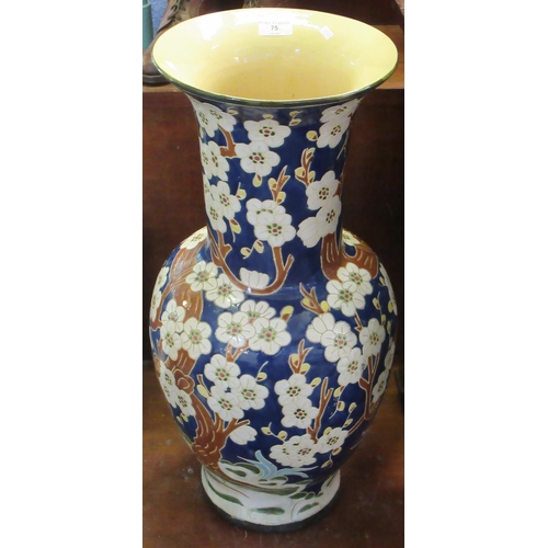 75 - Oriental design pottery floor vase, overall with prunus, flowers and foliage. Unmarked. 78cm high.
(... 