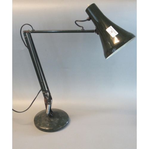 79 - Mid century anglepoise lamp on circular base.
(B.P. 21% + VAT)