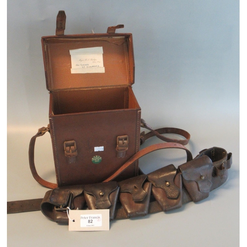 82 - WWI leather cartridge belt together with a leather military design case. (2)
(B.P. 21% + VAT)