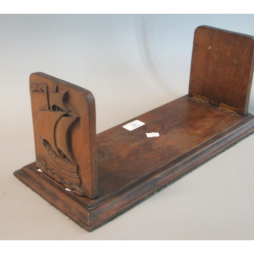 101 - Carved wooden bookends, the end panels decorated with sailing ships.  (B.P. 21% + VAT)