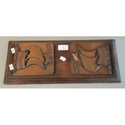 101 - Carved wooden bookends, the end panels decorated with sailing ships.  (B.P. 21% + VAT)