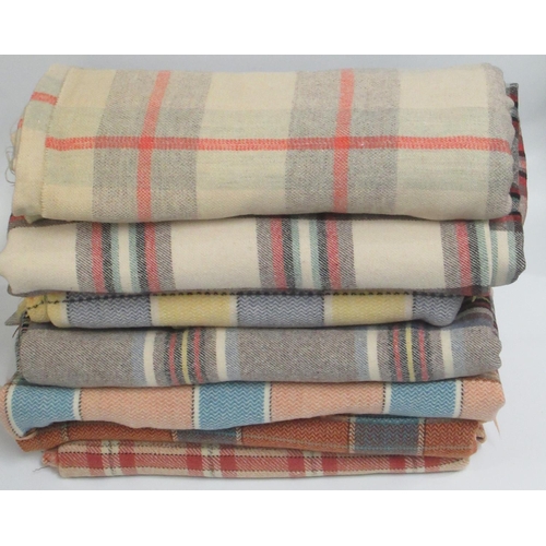 106 - 2 boxes comprising assorted checked blankets.  
(B.P. 21% + VAT)