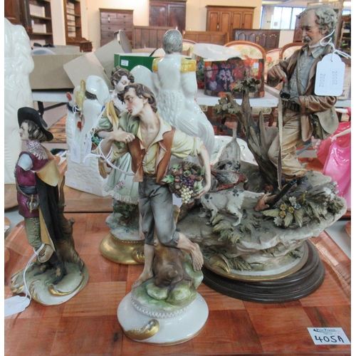 405A - 2 Trays of Capodimonte figurines, to include: a hunter with spaniels and pheasant, flower girl, moun... 