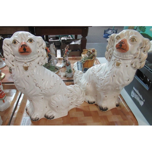 417 - Two 19th century Staffordshire dogs with hand-painted features and gilt highlights (2)  (B.P. 21% + ... 