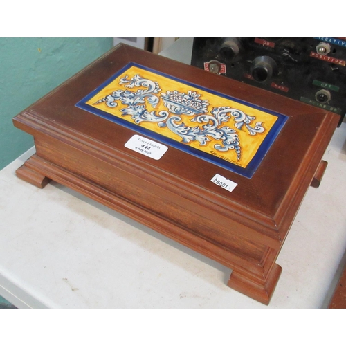 444 - Hardwood jewellery box with hinged cover, inset with a Fiance hand painted tile, bearing signature C... 