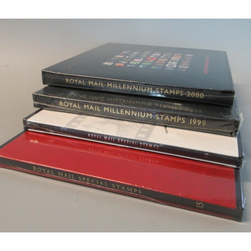 68 - Great Britain Year Books for 1996, 1998 and the millennium Year Book of 1999 and 2000 all are sealed... 