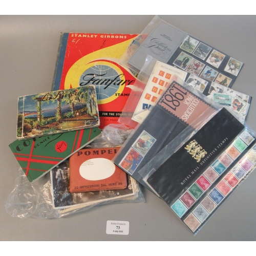 73 - Small box with album of all world stamps, few presentation and collectors packs, various postcards a... 