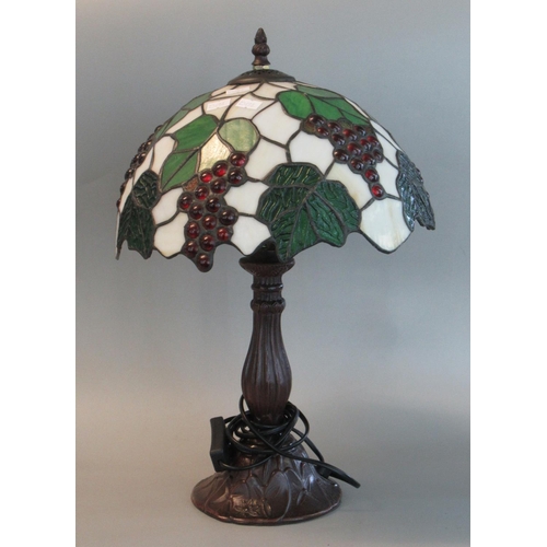 76 - Modern Tiffany style table lamp, the shade overall with leaf and berry decoration.  (B.P. 21% + VAT)