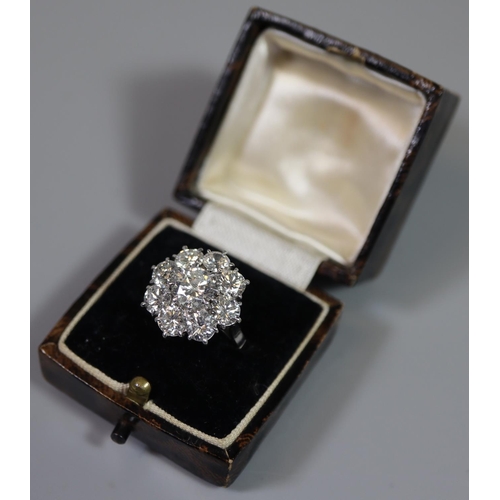 233 - Diamond cluster ring of a central brilliant cut diamond surrounded by eight brilliant cut diamonds. ... 