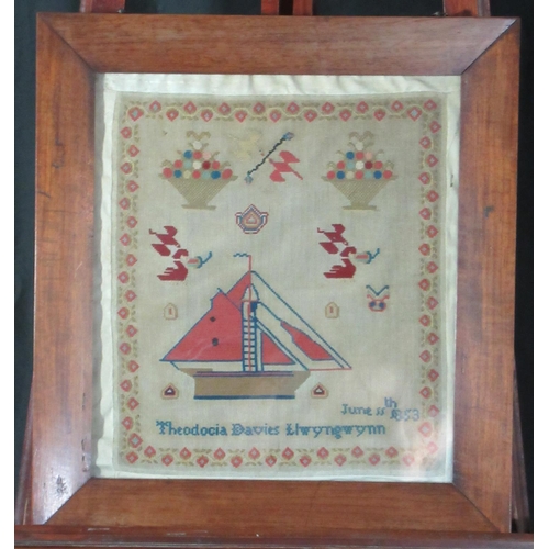 123 - 19th century Welsh sampler by Theodocia Davies Llwyngwynne, 1853.  Framed and glazed.  35x31cm appro... 