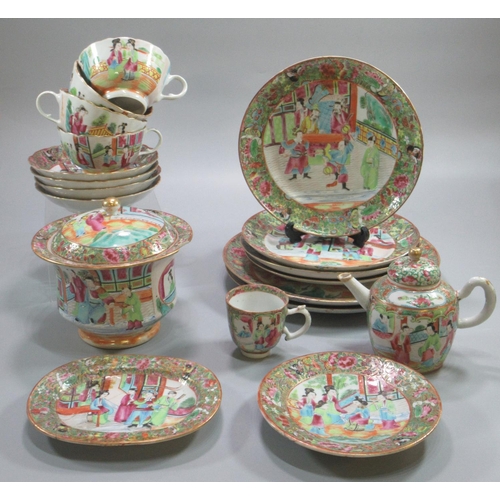 149 - A Chinese porcelain Canton tea service overall decorated in famille rose designs with designs of fig... 