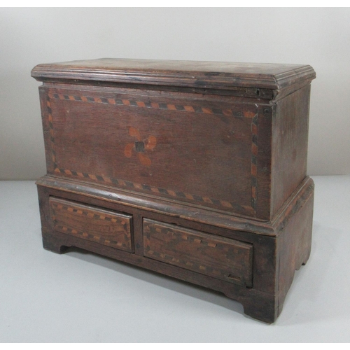 167 - Early 19th century Welsh oak miniature Coffwr Bach, the moulded hinged lid above herringbone inlay, ...