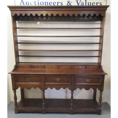 2 - 19th century oak two stage open back pot board dresser, the moulded cornice above a shaped apron wit... 