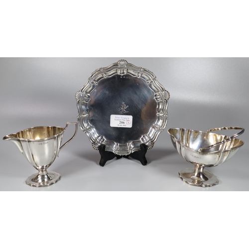 206 - Collection of silver items, to include: small salver with shell borders and central horse armorial, ... 