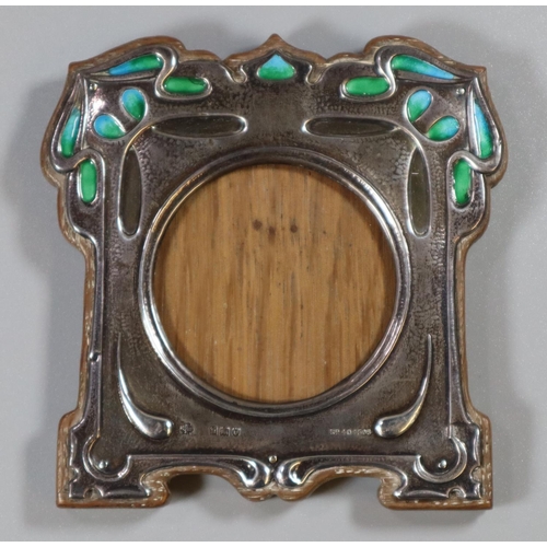 212 - Art Nouveau Liberty Style silver and enamel picture frame with stylised foliate panels enamelled in ... 