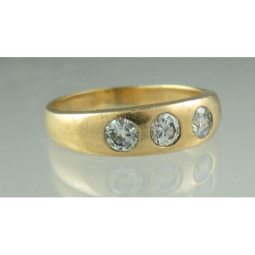 222 - Three stone diamond ring.  The three brilliant cut diamonds flush set in 18ct gold.  Ring size R.  A... 