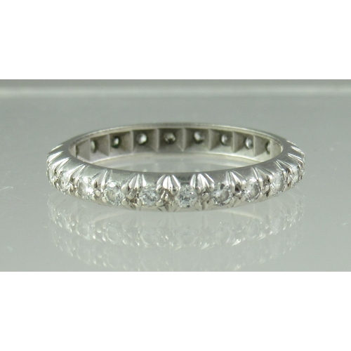 229 - A diamond full eternity ring.  Ring size O.  Approx weight 3.7 grams.
 (B.P. 21% + VAT)