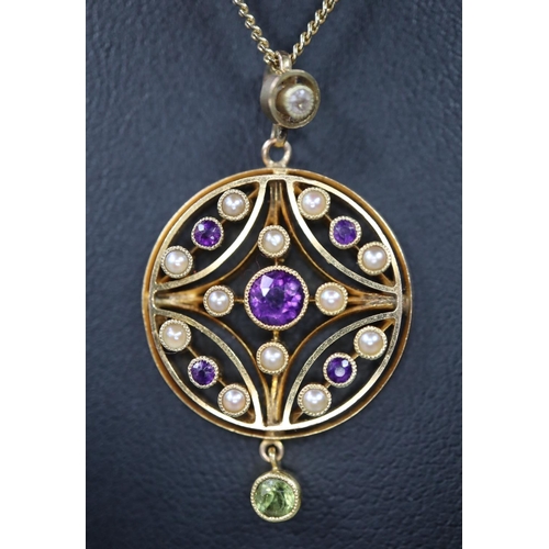 265 - An amethyst, pearl and peridot, ‘Suffragette’ pendant set in 15ct gold on a 14ct gold chain.  Approx... 