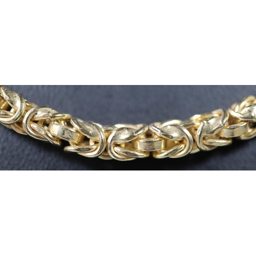 266 - A 9ct gold fancy link necklace.  Length 20 inches.  Approx weight 19.8 grams.
  (B.P. 21% + VAT)