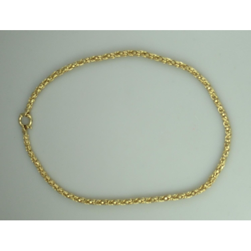 266 - A 9ct gold fancy link necklace.  Length 20 inches.  Approx weight 19.8 grams.
  (B.P. 21% + VAT)