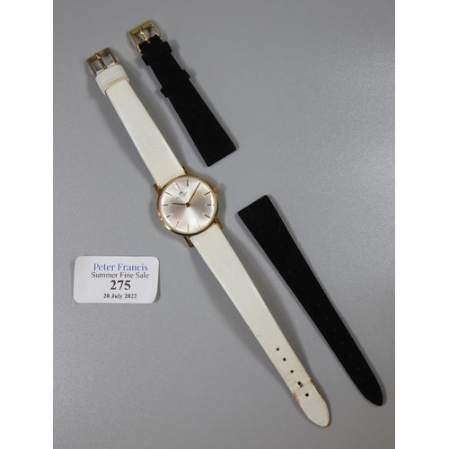 275 - 18ct gold Bucherer ladies mechanical wrist watch, having satin face with baton numerals on white lea... 