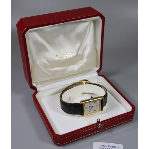 276 - Cartier gold plated on silver marked 925  Tank watch having Roman numerals, sweep second hand and da... 