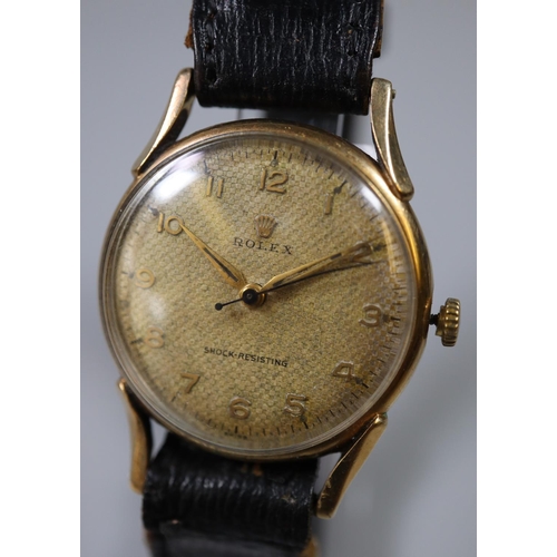 283 - Mid century Rolex 9ct gold gentleman's mechanical wristwatch, the face with Arabic numerals on a lea... 