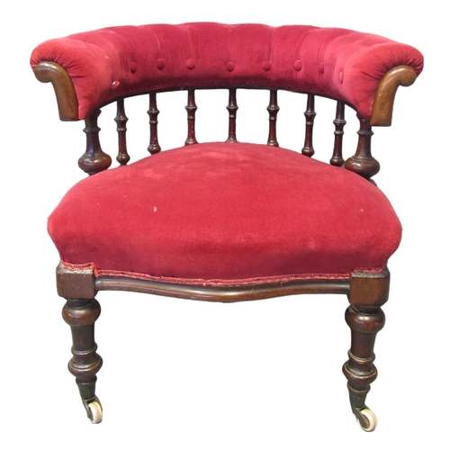 63 - Late Victorian mahogany upholstered button and spindle back tub type bedroom chair, having serpentin... 