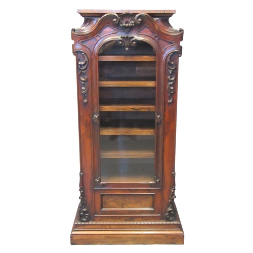 64 - Early 19th century rosewood sheet music cabinet, the moulded top above a single glazed arched door o... 