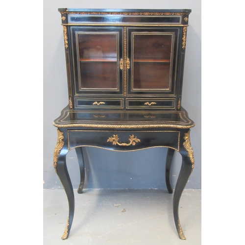 67 - Victorian French design ebonised and gilded ladies two stage bonheur du jour, the shaped cornice abo... 