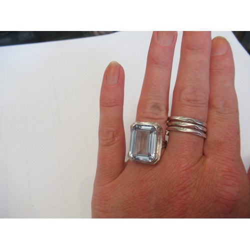 231 - An aquamarine ring set in 18ct white gold.  The large step cut aquamarine approx 18x 12mm.  Ring siz... 