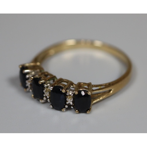 229 - 9ct gold 4 stone claw setting dress ring 2g approx. size N.  (B.P. 21% + VAT)