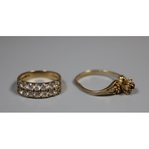 233 - Two 9ct gold stone set dress rings.  4.5g approx.  
(B.P. 21% + VAT)